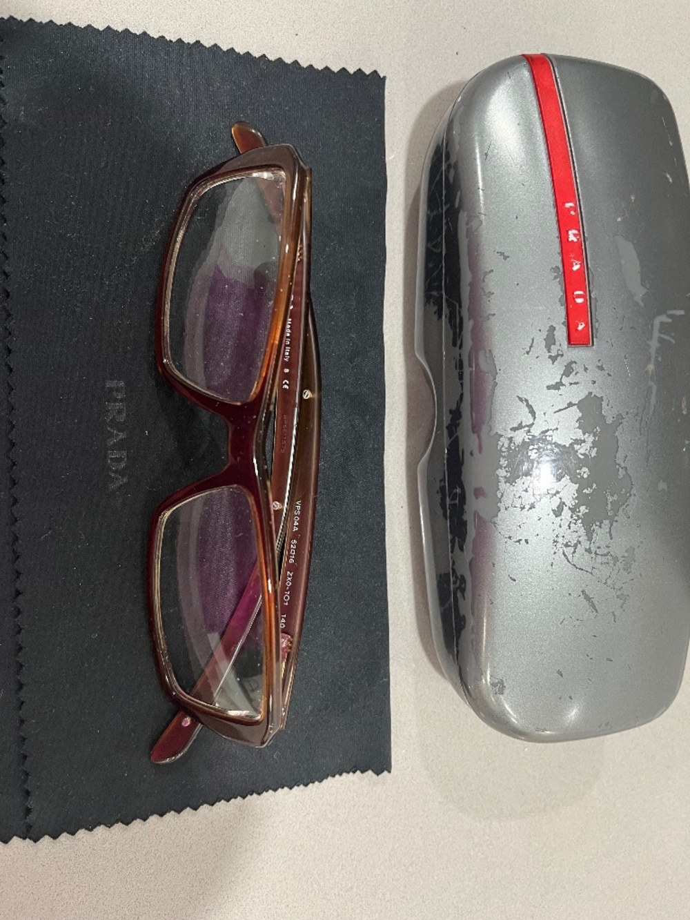 Prada Brown Glass Frames with Case and Lens Cloth.